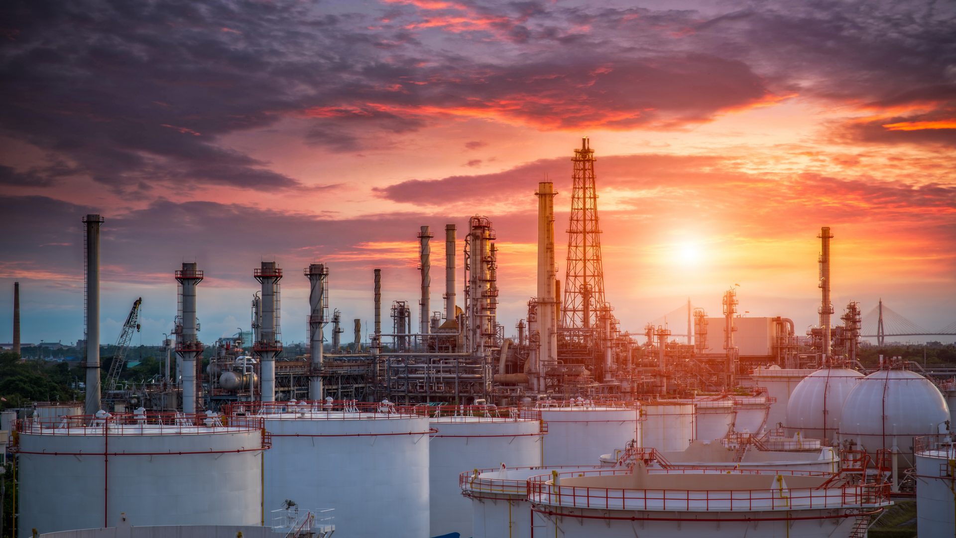 Oil and gas industry - refinery factory - petrochemical plant at sunset