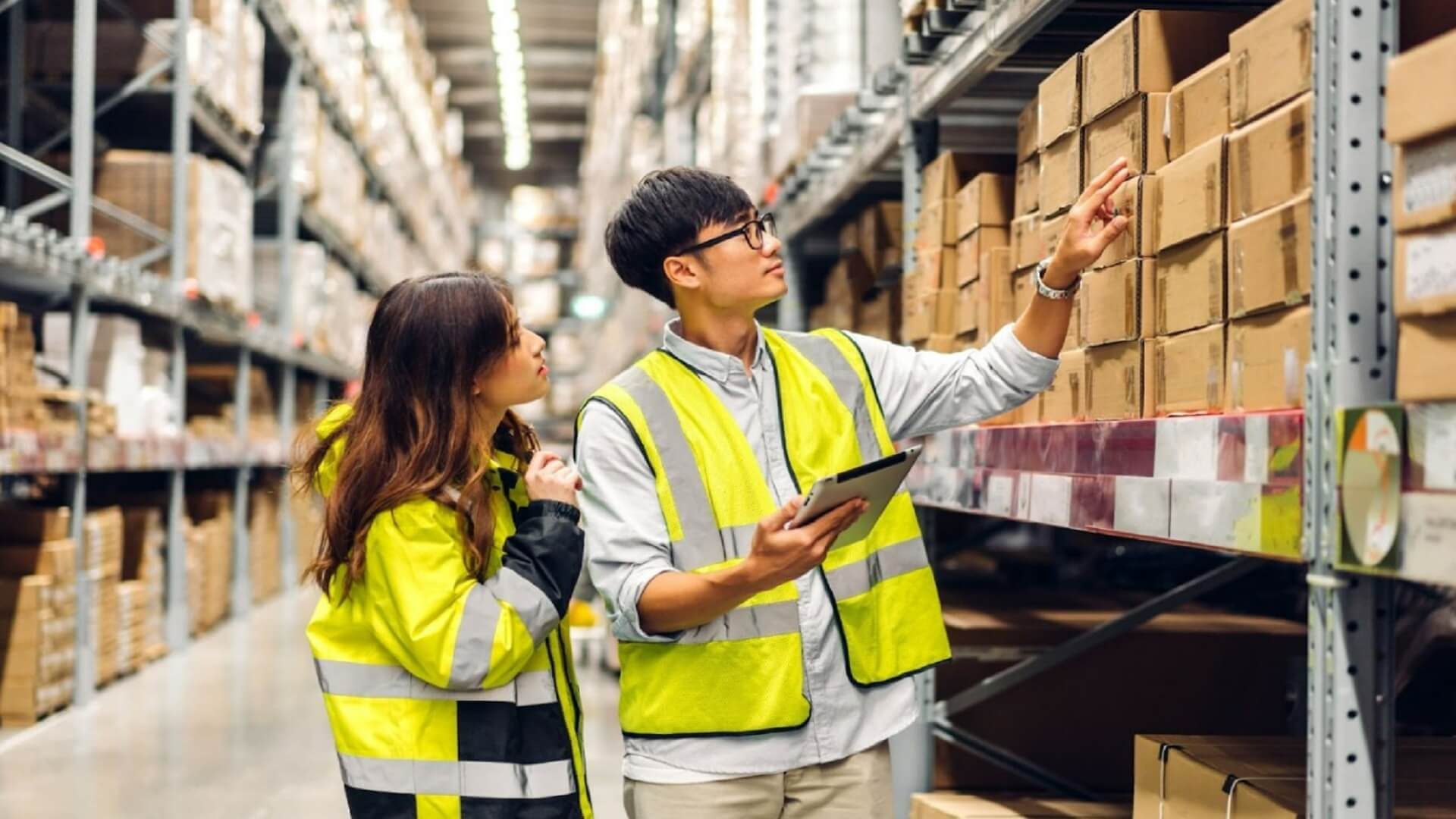 Man and woman in a warehouse