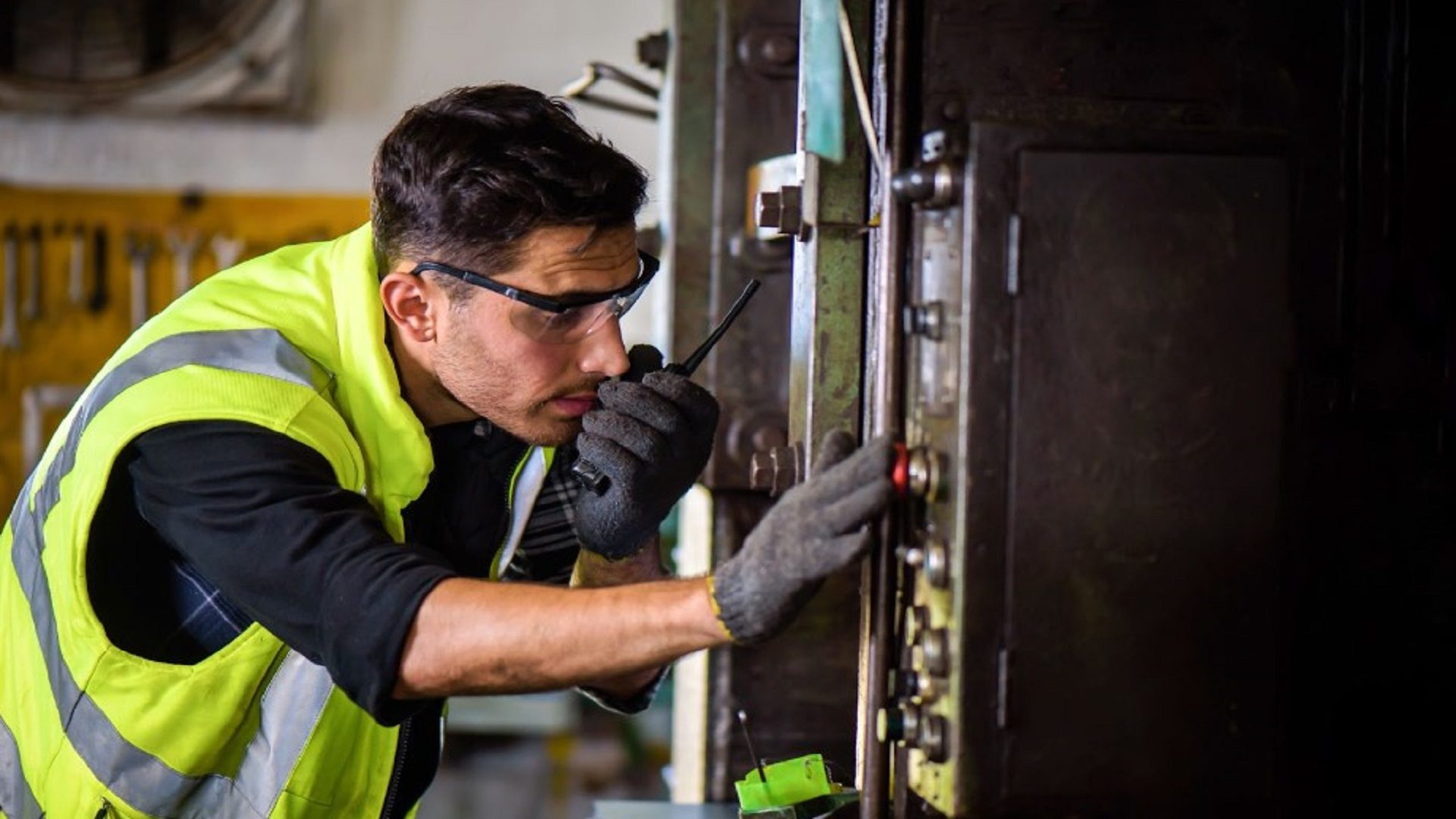 Man wearing a green vest Man wearing a green vest