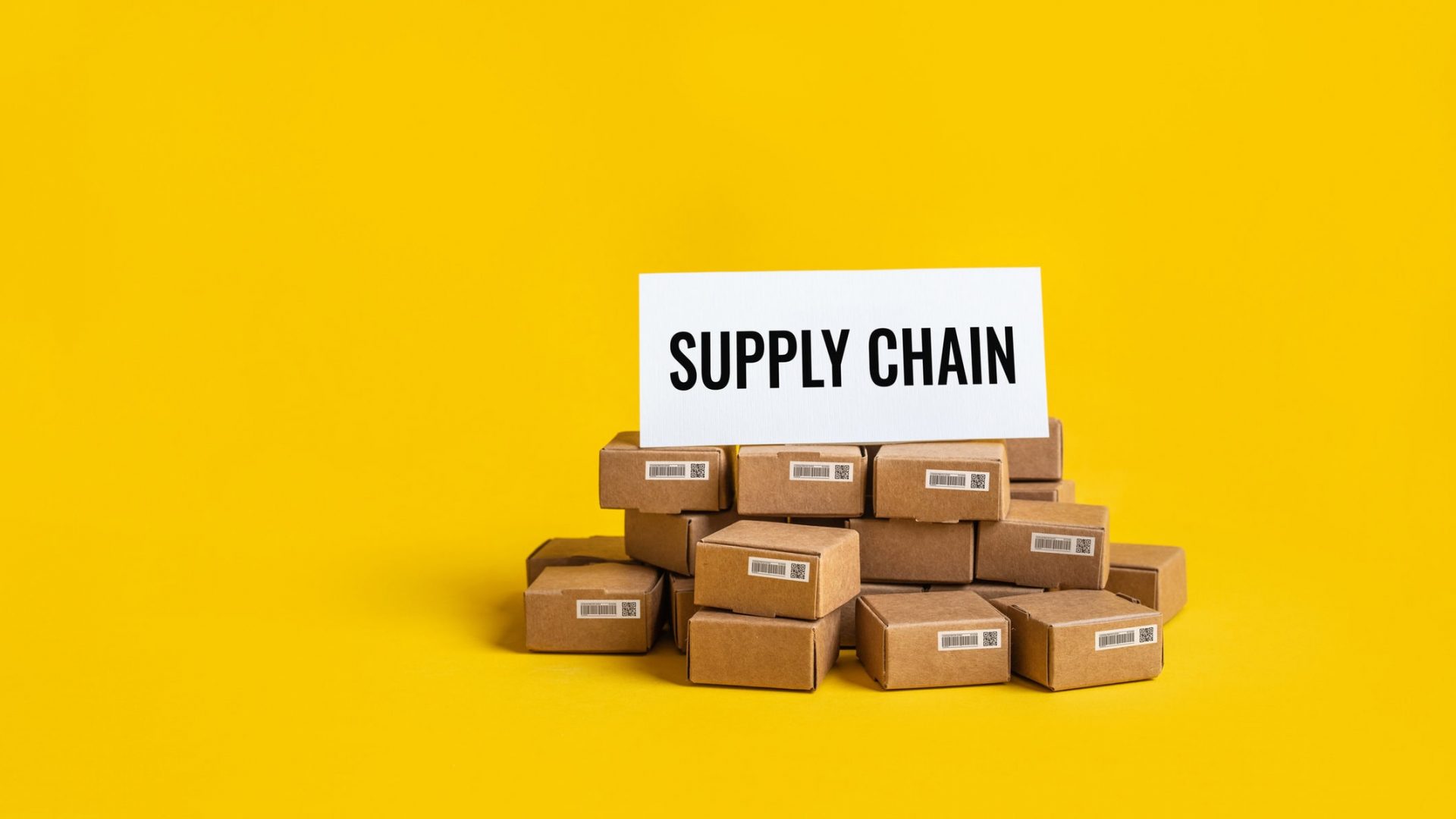 Efficient supply chain management with inventory boxes and a clear supply chain sign.