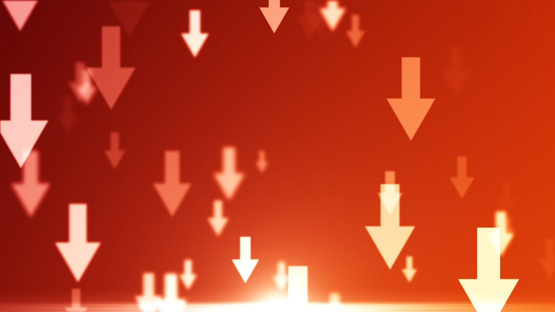 Downward trending arrows representing supply chain reduction and cost optimization in manufacturing.