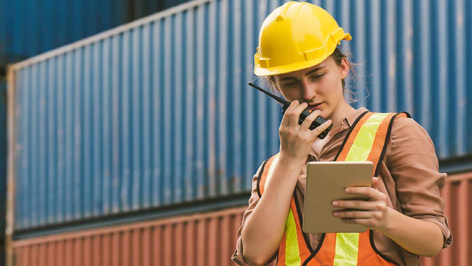 Woman wearing a yellow hardhat Woman wearing a yellow hardhat