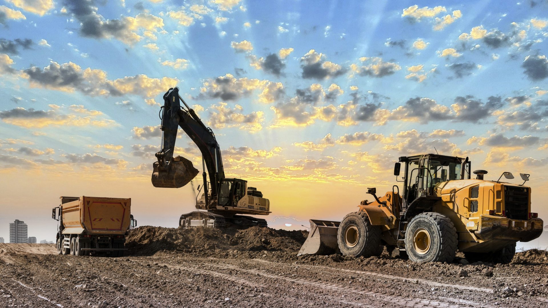 Excavators working on construction site at sunset MRO inventory optimizatin for Mining