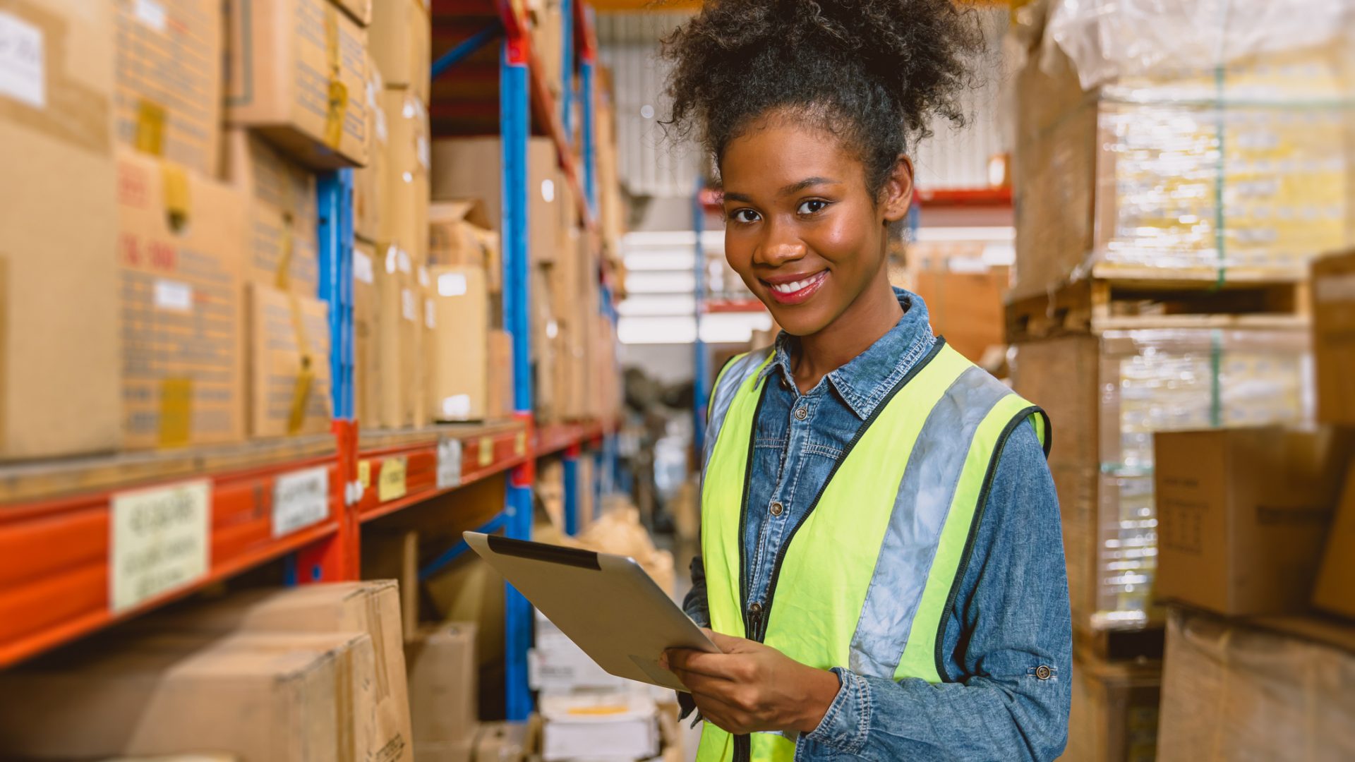 woman worker black African girl teen working in cargo warehouse inventory employee staff portrait happy smile Filling Gen Z Gap
