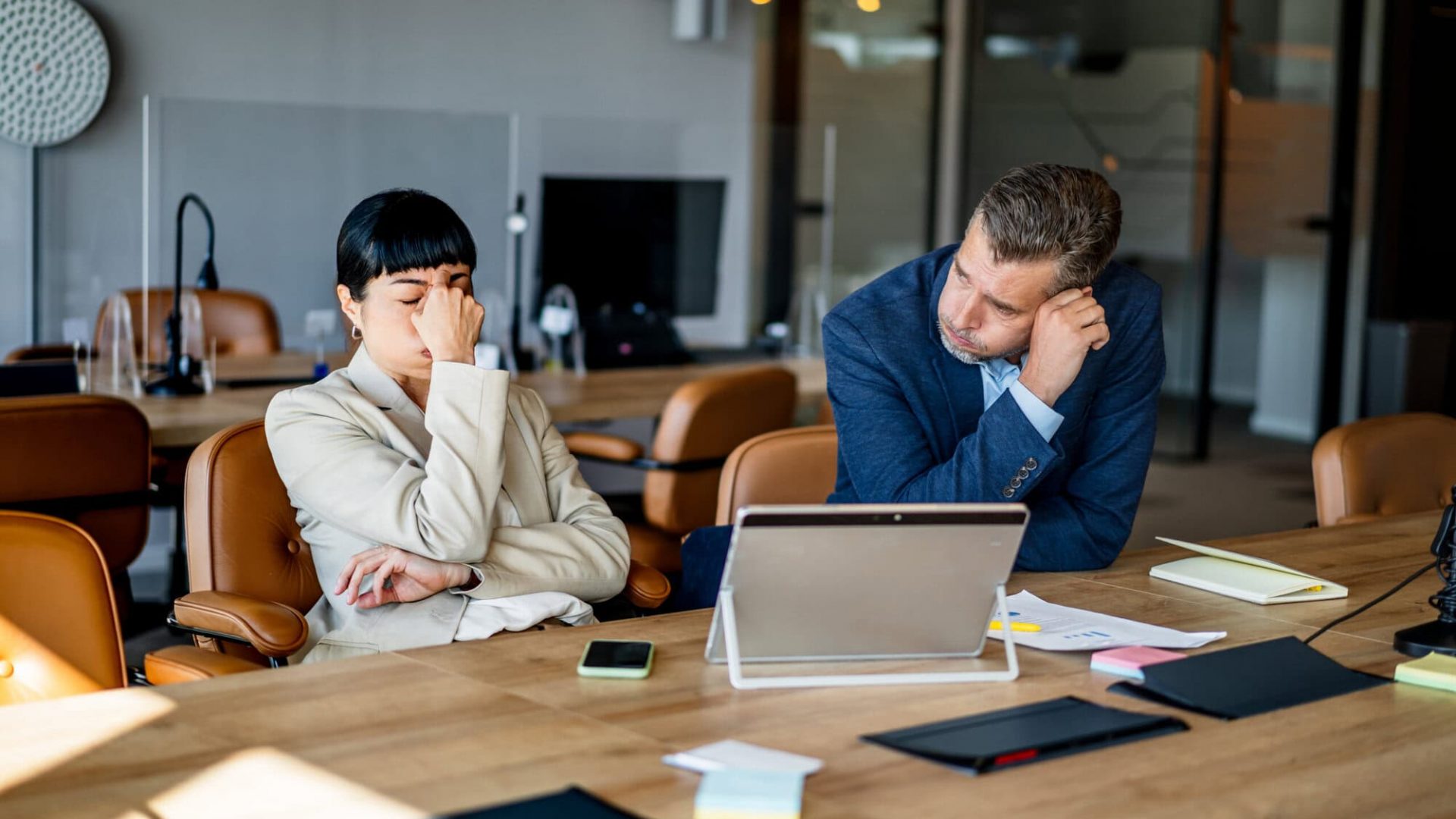 Stressed business people having problems at work